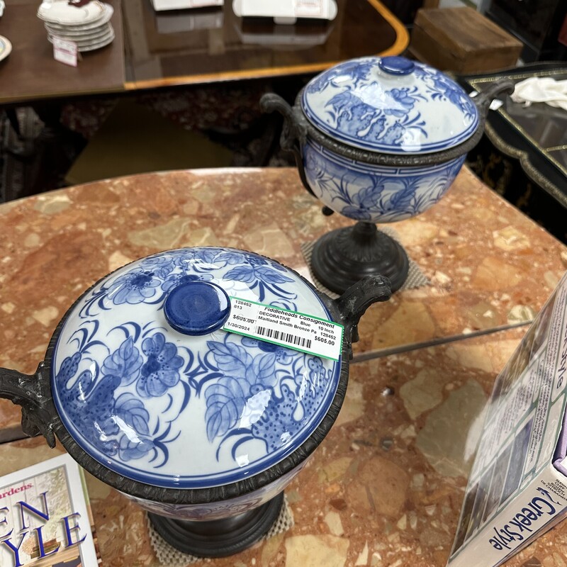 Two Maitland Smith Bronze urns, blue and white. Sold as a PAIR.
Size: 10in H