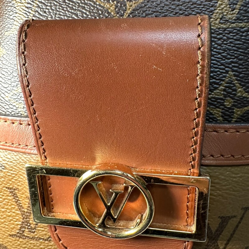 Louis Vuitton Dauphine Hobo MM Reverse<br />
<br />
Date Code: DU1260<br />
<br />
Dimensions:<br />
Base length: 12.00 in<br />
Height: 10.50 in<br />
Width: 5.50 in<br />
Drop: 7.00 in<br />
Drop: 22.00 in<br />
<br />
Very Good condition. Wear to the hardware and the leather trim.<br />
<br />
Comes with original dust bag. No box.