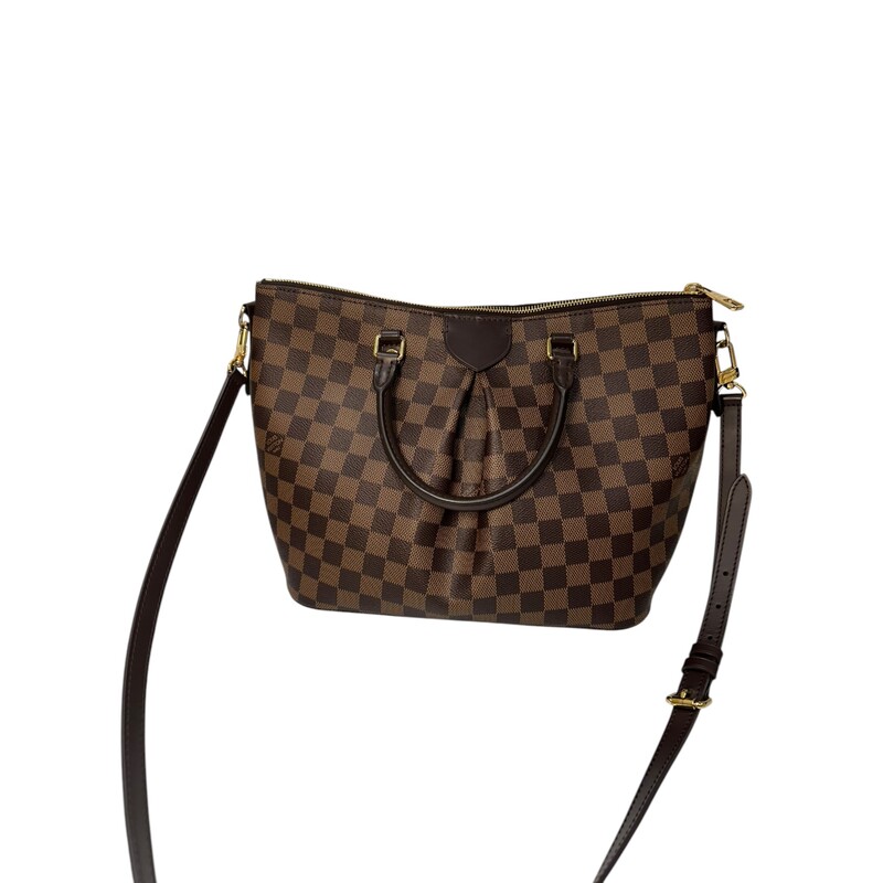 Louis Vuitton Siena MM Damier Ebene<br />
<br />
Date Code:TJ5210<br />
<br />
Dimensions:<br />
Base length: 11 in<br />
Height: 9.5 in<br />
Width: 5.75 in<br />
Drop: 4 in<br />
Drop: 19.5 in<br />
<br />
Excellent condition. Light stain in interior.<br />
<br />
Does not come with the original dust bag or box.