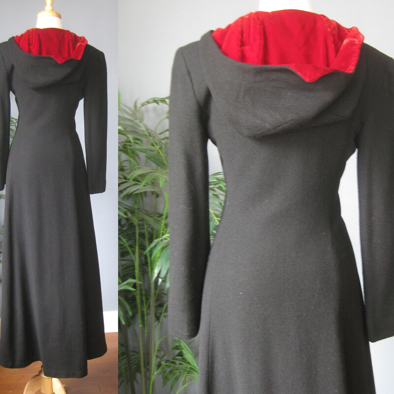 Long and Slim Black Wool coat with a hood.
Romantic and striking!
Seems to have been handmade.
The hood and front facing is lined with red velvet.
The body of the coat has a warm interlining and another orange lining next to the body.
Button Closure
It's quite small.  Made for a teenager's body.  My mannequin fits a modern size 4 nicely.  This coat does button up on my mannequin but it is too snug for practical purposes.
Here are the flat measurements, please double where appropriate:
Shoulder to shoulder: 17
Armpit to armpit: 18
Waist: 14.75
Hip: 19.5
Underarm sleeve seam length: 16
Length: 55.5  This might be long for your teen but it wouldn't be too hard to take it up.
Excellent condition  The only flaw is some stains on one part of the orange lining as shown.
Thanks for looking!
#82459