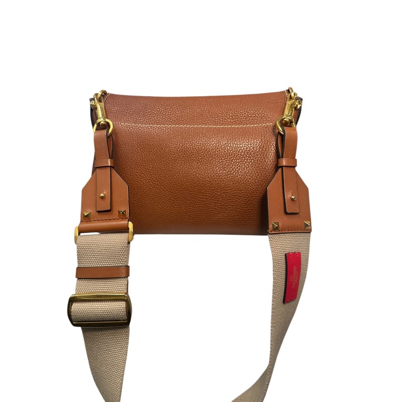 Valentino V Ring Flap Calfskin Crossbody<br />
<br />
Dimensions:<br />
10L X 6.5H<br />
16  strap drop<br />
<br />
Very Good condition. Some minor marks on hardware.<br />
<br />
<br />
Does not come with the original dust bag or box.