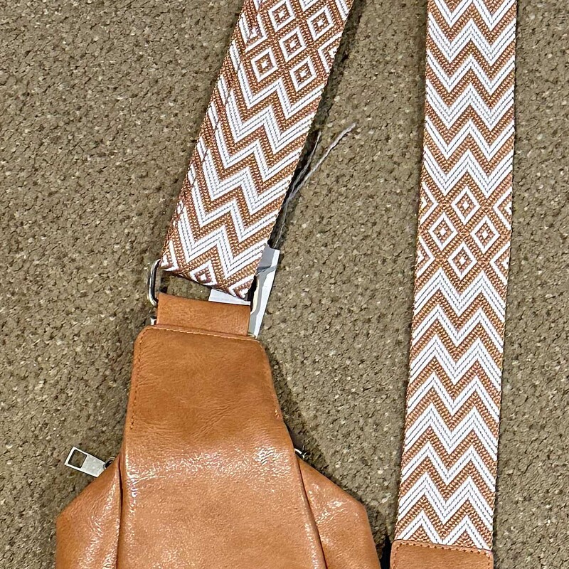 Small Brown Leather Bag with Brown and White Strap<br />
Can be Configured for a Backpack<br />
7 In Wide x 25 In Long