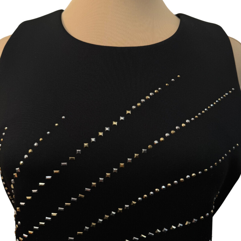 Calvin Klein Dress<br />
Sleeveless<br />
Bejeweled Accent that Makes This Stunning!<br />
Color: Black<br />
Size: 8