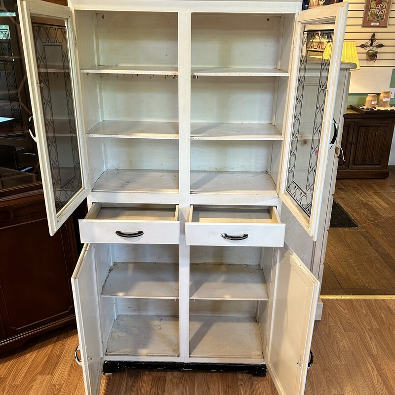 Ant. Art Deco Cupboard,<br />
 Size: 65 X 31 X 12<br />
White antique period cupboard with black detailing on glass. 3 moving towel bars on the side.<br />
This is a great piece!