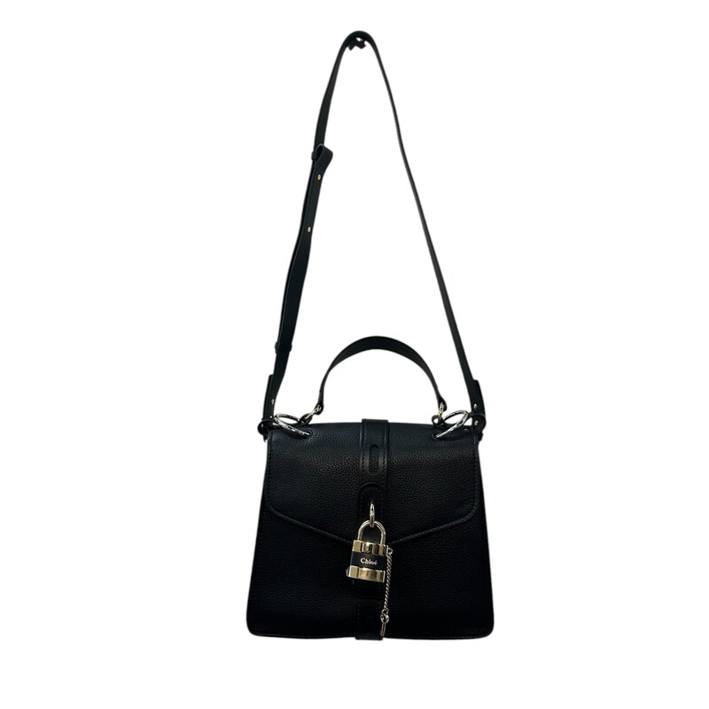 Chloe Aby Padlock Black Two Way Handbag<br />
<br />
Factory Code:03 1970652<br />
<br />
Dimensions:<br />
2 L x 4.5 W x 10 H<br />
<br />
Very Good condition.<br />
<br />
<br />
Does not come with the original dust bag or box.