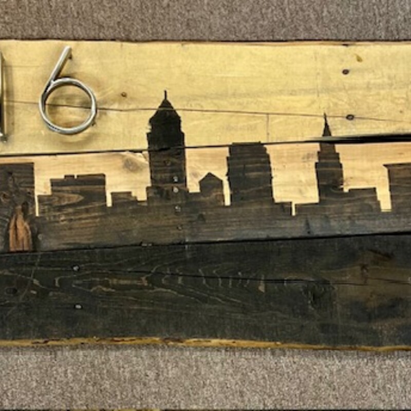 216 Cleveland Skyline On Wood
Brown, Tan and Silver
 Size: 38x17H