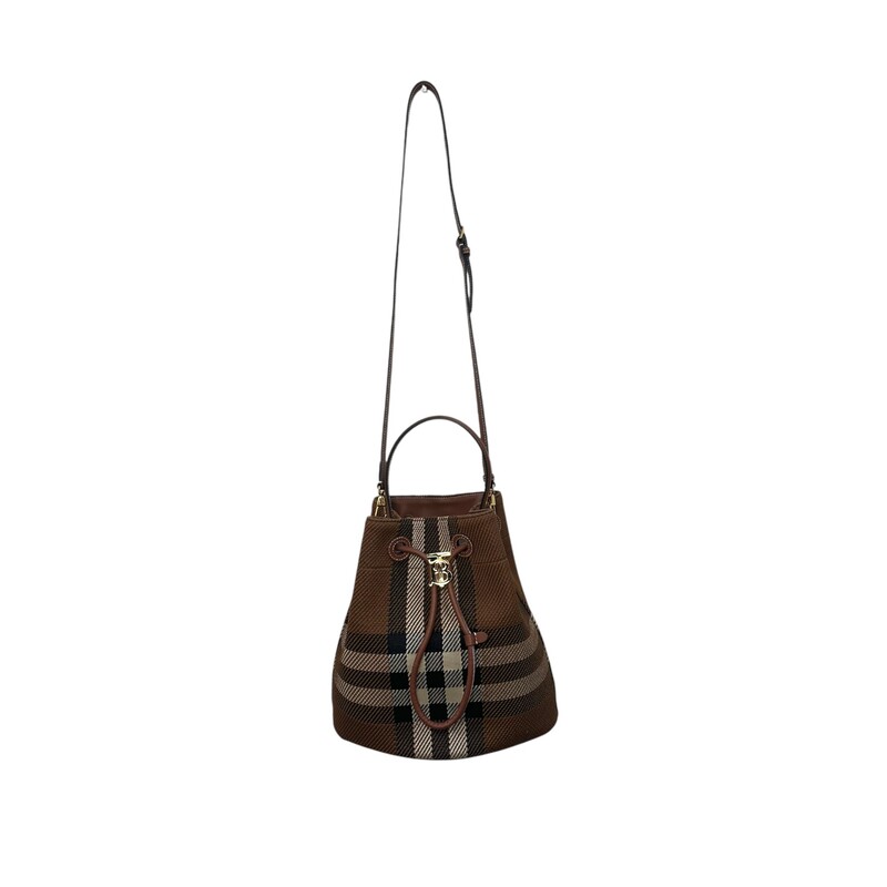 Burberry TB Brown Small Knit Check<br />
<br />
Material: fabric with leather trim<br />
Interior Material: Canvas Plain<br />
Hardware Color: Gold<br />
<br />
Place of Origin: UK<br />
<br />
Product Features:<br />
Removable Strap<br />
Adjustable Strap<br />
Drawstring Closure<br />
<br />
Condition: Like new.<br />
Accessories: Dust Bag,<br />
Measurements: Height 11, Width 10.5, Depth 6.5<br />
<br />
Serial #TIVITP1262