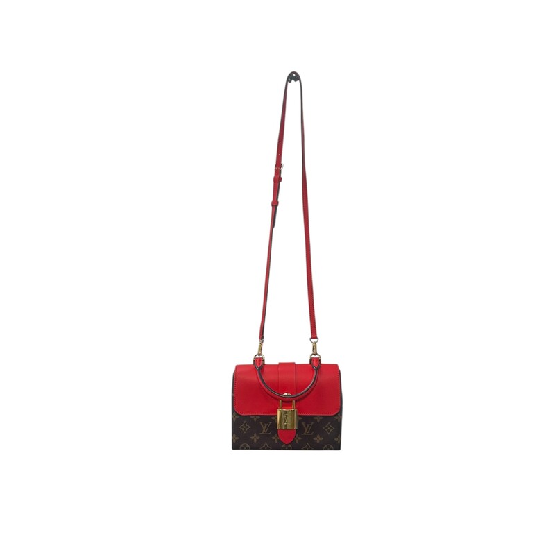 Louis Vuitton Locky BB Red Handbag<br />
<br />
Date Code: AA0280<br />
<br />
Dimensions:<br />
7.9 x 6.3 x 3 inches<br />
(Length x Height x Width)<br />
<br />
In very condition. Scratching to the lock and light wear to the canvas.<br />
<br />
Comes with original dust bag. No box.