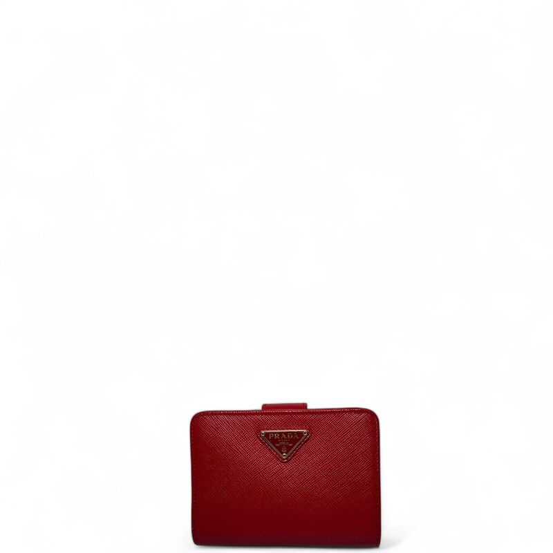 Prada Portafoglio Lamp Red Wallet

Factory Code: 107F

Dimensions:
Height : 3.54 in.
Depth : 1.18 in.
Width : 14cm

In very good condition. Light wear theoughout the wallet.

Comes with original dust bag and box.