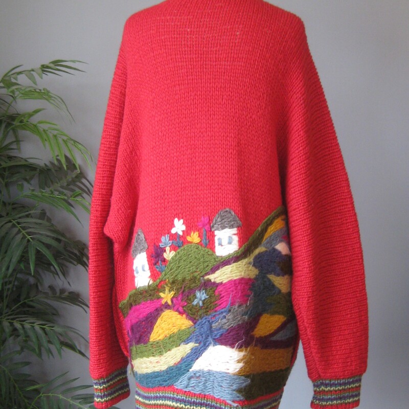 Vtg Wool ? Scenic CCozy Vintage Handmade cardigan sweater<br />
Red with pretty yarn embroidery all around the hem.<br />
It was made for my consignor years ago.<br />
No tags, but I believe it's nice acrylic or maybe even wool<br />
Button and loop closures<br />
Should fit a modern size 3X<br />
flat measurements:<br />
armpit to armpit: 28<br />
length: 33<br />
Great vintage condition.  the yarn embroidery has developed a bit of nap as shown in the close photo.<br />
thanks for looking!<br />
#81164ardiga, Red, Size: XL