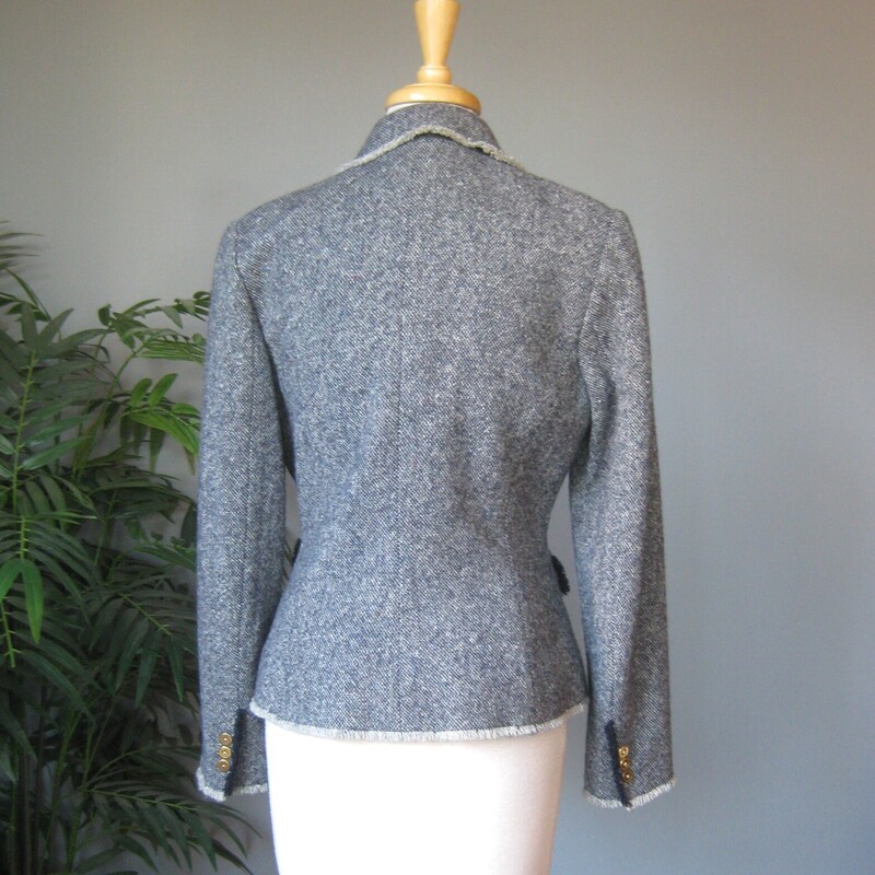 Stunning classic blazer with high end details inside and out<br />
Blue wool tweed w gorgeous silk equestrian print lining.<br />
all four pockets work<br />
the edges have delicate fringe a la you know who!<br />
Gold buttons<br />
Size 6<br />
flat measurements:<br />
shoulder to shoulder: 15.5<br />
armpit to armpit: 18.5<br />
waist area: measured on the outside: 16<br />
width at hem: 19<br />
length: 24<br />
underarm sleeve seam length: 17<br />
<br />
perfect condition!<br />
thanks for looking!<br />
#80828