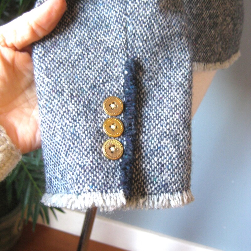 Stunning classic blazer with high end details inside and out<br />
Blue wool tweed w gorgeous silk equestrian print lining.<br />
all four pockets work<br />
the edges have delicate fringe a la you know who!<br />
Gold buttons<br />
Size 6<br />
flat measurements:<br />
shoulder to shoulder: 15.5<br />
armpit to armpit: 18.5<br />
waist area: measured on the outside: 16<br />
width at hem: 19<br />
length: 24<br />
underarm sleeve seam length: 17<br />
<br />
perfect condition!<br />
thanks for looking!<br />
#80828