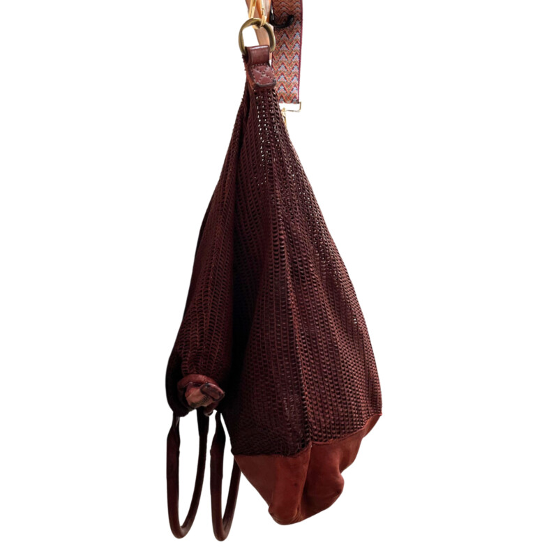 Giorgio Brato Foldover Tote/ Crossbody Handbag<br />
Now Trending!! Strikingly casual, strappy and gorgeous! This is, Giorgio Brato, in Bordeaux. Noteable, high quality Italian leather! Large, yet light, roomy for on flight! Take it and set off on an adventure!<br />
Missing crossbody strap, we have added a new one included with purchase<br />
One zippered inside pocket<br />
Now this is a bag!<br />
Width: 16.5 inches<br />
Length: 31inches<br />
Handle Drop: 8 inches