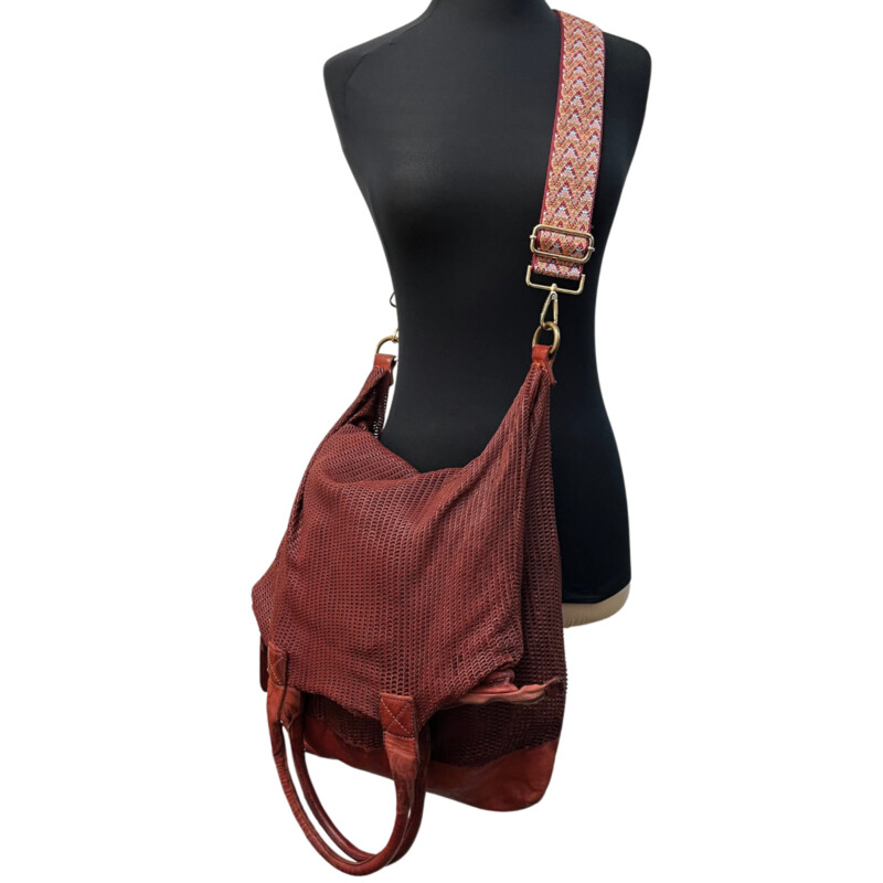 Giorgio Brato Foldover Tote/ Crossbody Handbag<br />
Now Trending!! Strikingly casual, strappy and gorgeous! This is, Giorgio Brato, in Bordeaux. Noteable, high quality Italian leather! Large, yet light, roomy for on flight! Take it and set off on an adventure!<br />
Missing crossbody strap, we have added a new one included with purchase<br />
One zippered inside pocket<br />
Now this is a bag!<br />
Width: 16.5 inches<br />
Length: 31inches<br />
Handle Drop: 8 inches