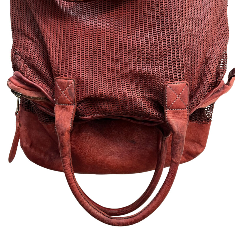 Giorgio Brato Foldover Tote/ Crossbody Handbag<br />
Now Trending!! Strikingly casual, strappy and gorgeous! This is, Giorgio Brato, in Bordeaux. Noteable, high quality Italian leather! Large, yet light, roomy for on flight! Take it and set off on an adventure!<br />
Missing crossbody strap, we have added a new one included with purchase<br />
One zippered inside pocket<br />
Now this is a bag!<br />
Width: 16.5 inches<br />
Length: 31inches<br />
Handle Drop: 8 inches