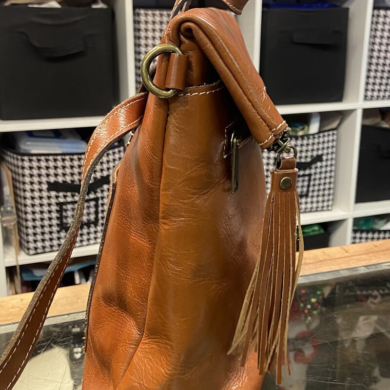 Camel Leather Backpack<br />
Camel<br />
Size: R $249