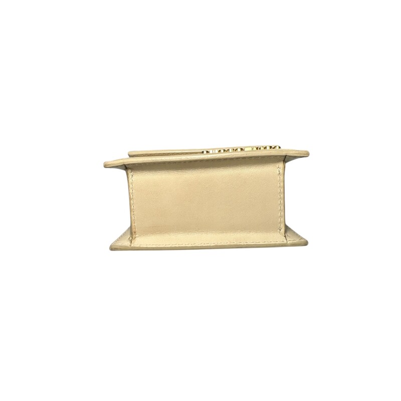 Jacquemus Le Chiquito Moyen Ivory Mini<br />
<br />
Dimensions: 4.7H x 3.7W x 2D<br />
<br />
In very condition. Tarnishing to tthe hardware. Some corner wear.<br />
<br />
Does not come with the original dust bag or box.