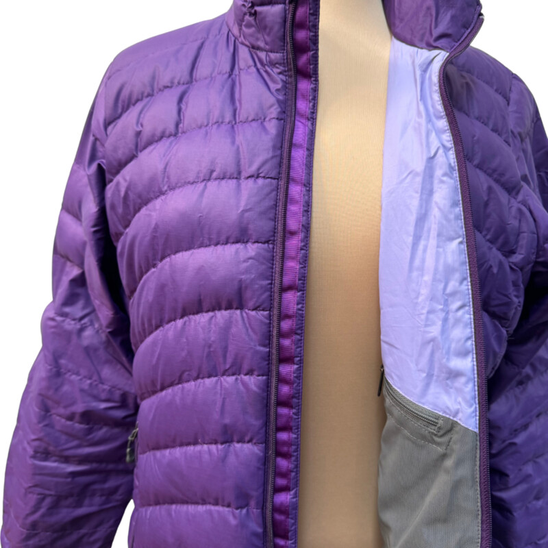 Patagonia Down Jacket<br />
Flawed Gem   See Photos<br />
Zipper Closure<br />
Color:  Purple<br />
Size: Medium<br />
Still a Cute and Warm Jacket!