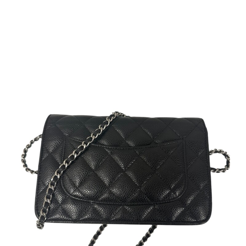 Chanel  Black Caviar Wallet On A Chain<br />
<br />
Date Code:<br />
<br />
U83****<br />
<br />
Dimensions:<br />
<br />
7.5 W x 5 H x 1 D<br />
<br />
Very Good condition. Some minor marks in the interior.<br />
<br />
Does come with the original dust bag and box.