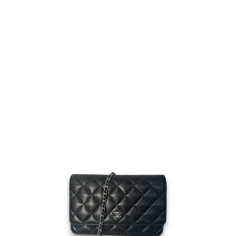 Chanel  Black Caviar Wallet On A Chain

Date Code:

U83****

Dimensions:

7.5 W x 5 H x 1 D

Very Good condition. Some minor marks in the interior.

Does come with the original dust bag and box.