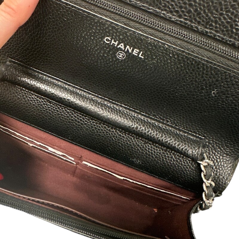 Chanel  Black Caviar Wallet On A Chain

Date Code:

U83****

Dimensions:

7.5 W x 5 H x 1 D

Very Good condition. Some minor marks in the interior.

Does come with the original dust bag and box.