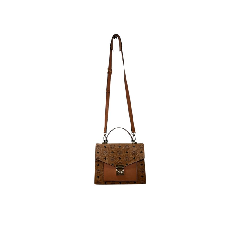 MCM Patricia Brown Top Handle<br />
<br />
Dimensions:<br />
Base length: 10.50 in<br />
Height: 7.75 in<br />
Width: 3.25 in<br />
Drop: 3.25 in<br />
Drop: 18.50 in to 0.00 in<br />
<br />
In vey good condition. Light wear to the exterior and interior.<br />
<br />
Comes with original dust bag. No box.