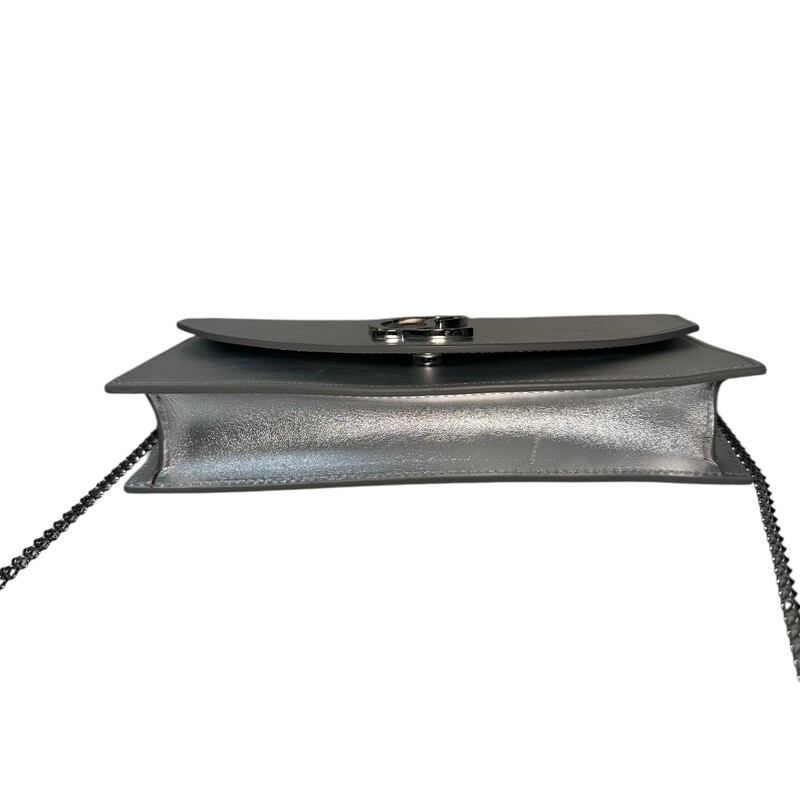 Louboutin Loubi 45 Silver Clutch With Detachable Chain<br />
<br />
Dimensions:<br />
9L  x 5H<br />
<br />
Very good condition. Some minor scrathces on leather shown in photos.<br />
<br />
Does not come with the original dust bag or box.