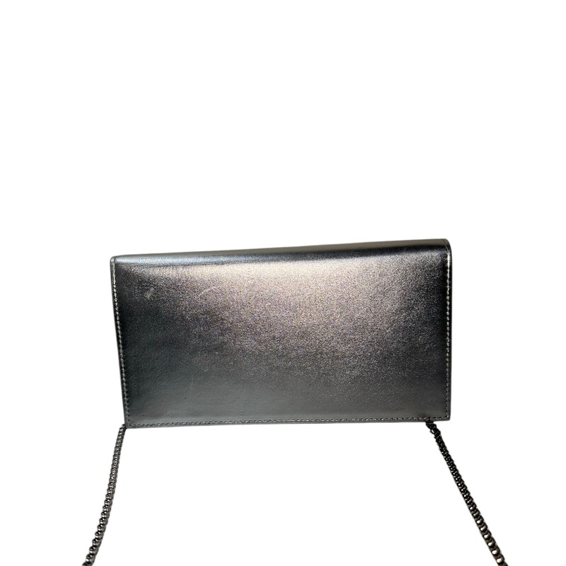 Louboutin Loubi 45 Silver Clutch With Detachable Chain

Dimensions:
9L  x 5H

Very good condition. Some minor scrathces on leather shown in photos.

Does not come with the original dust bag or box.