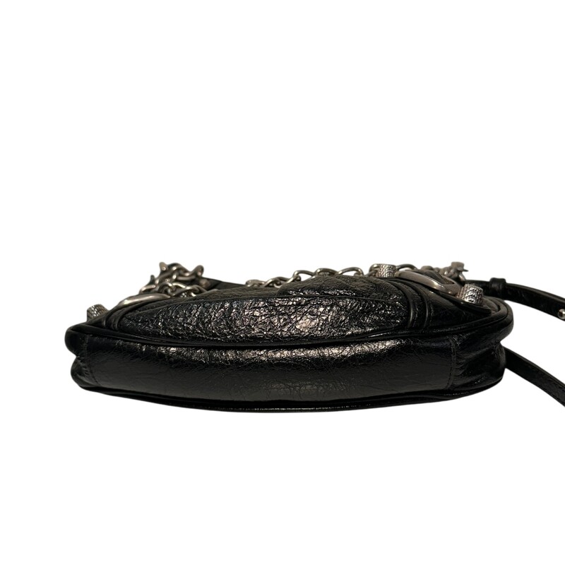 Balenciaga Le Cagole Mini Lambskin Crossbody<br />
<br />
Date Code 695814.1000 R527545<br />
<br />
Dimensions:<br />
<br />
8.2''W x 5.1''H x 1.7''D<br />
Shoulder chain strap with one hook, 15.7''<br />
Adjustable and removable crossbody strap, 40.5''<br />
<br />
Good condition. Interior stains.<br />
<br />
Comes with original dust bag. No box.