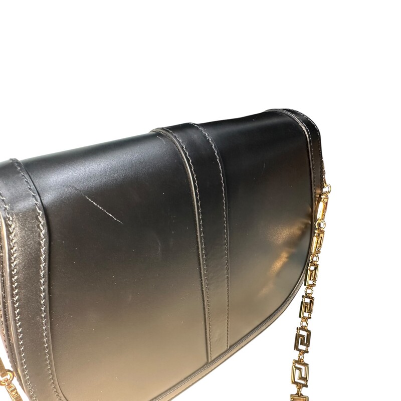 Versace Goddess Shoulder Black Bag<br />
<br />
Code: 04C0DD21B7580<br />
<br />
Dimensions: 9.5 Length x 7 Heigth<br />
<br />
<br />
Very good condition. Minor sctraching of the leather.<br />
<br />
<br />
Does not come with the original dust bag or box.