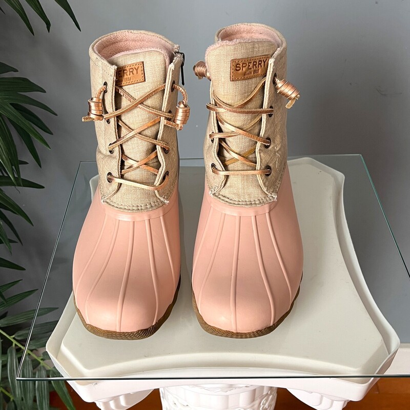 Brand new pair of adorable waterproof Duck Boots<br />
Pastel Pink and cream with laces and side zippers.<br />
These are Sperry Saltwater<br />
Size 9.5<br />
<br />
thanks for looking!<br />
#82447<br />
<br />
PLEASE NOTE - to save on shipping I will not be shipping these with the box.<br />
If you want the box pls get in touch before purchasing as the shipping cost will have to be adjusted.