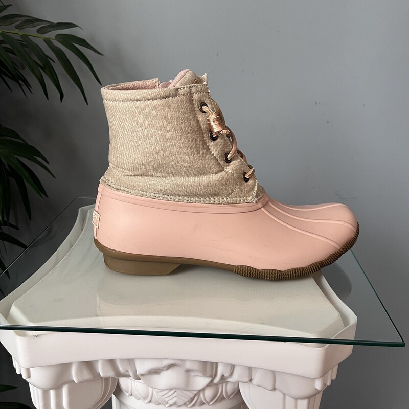 Brand new pair of adorable waterproof Duck Boots<br />
Pastel Pink and cream with laces and side zippers.<br />
These are Sperry Saltwater<br />
Size 9.5<br />
<br />
thanks for looking!<br />
#82447<br />
<br />
PLEASE NOTE - to save on shipping I will not be shipping these with the box.<br />
If you want the box pls get in touch before purchasing as the shipping cost will have to be adjusted.