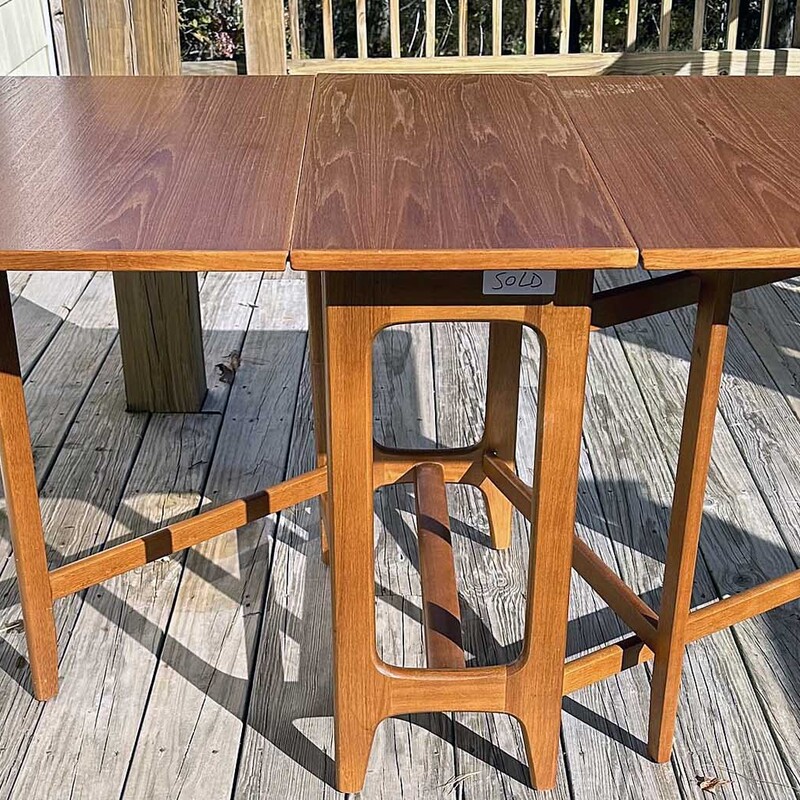 Norwegian Drop Leaf  Table
Size: 64x35x29
This wonderful dropleaf table was designed by Bendt Winge for Klepps Mobelfabrik in Norway in the 1950s/60s.  It opens to 64 inches but when closed, it only takes up 13.5 inches.  There are two gatelegs per side for stability.  It is made from Jacaranda, also know as Brazilian rosewood. It is in very good condition but there are a few areas of wear on the top.   The perfect dining table for any home.