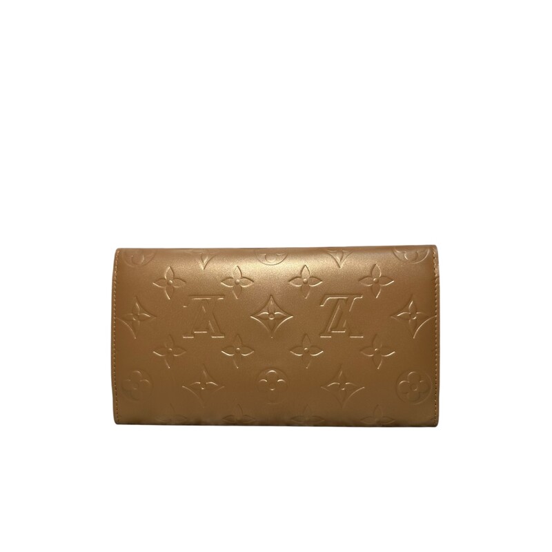 Louis Vuitton Matte Gold Wallet<br />
<br />
Date Code:TH0093<br />
<br />
Dimensions:<br />
Height: 4<br />
Width: 7.25<br />
Depth: 1<br />
<br />
Very Good condition. Minor marks on hardware<br />
<br />
Does not come with the original dust bag or box.