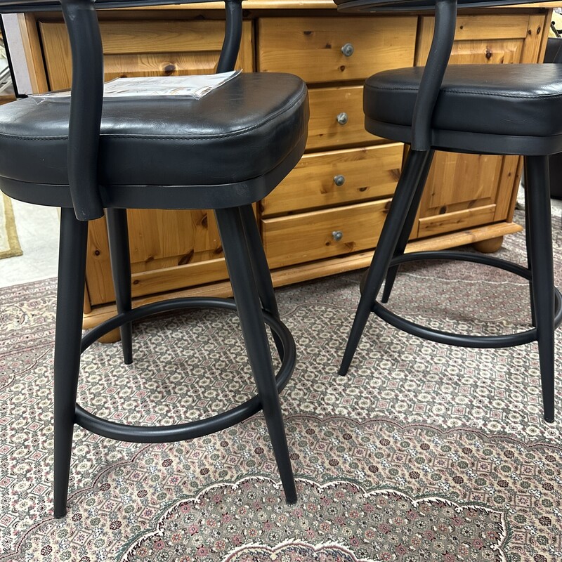 Two Faux Leather Stools, Black. Sold together as a PAIR. In like-new condition. Each chair retails for $275.<br />
Size: 26in Seat