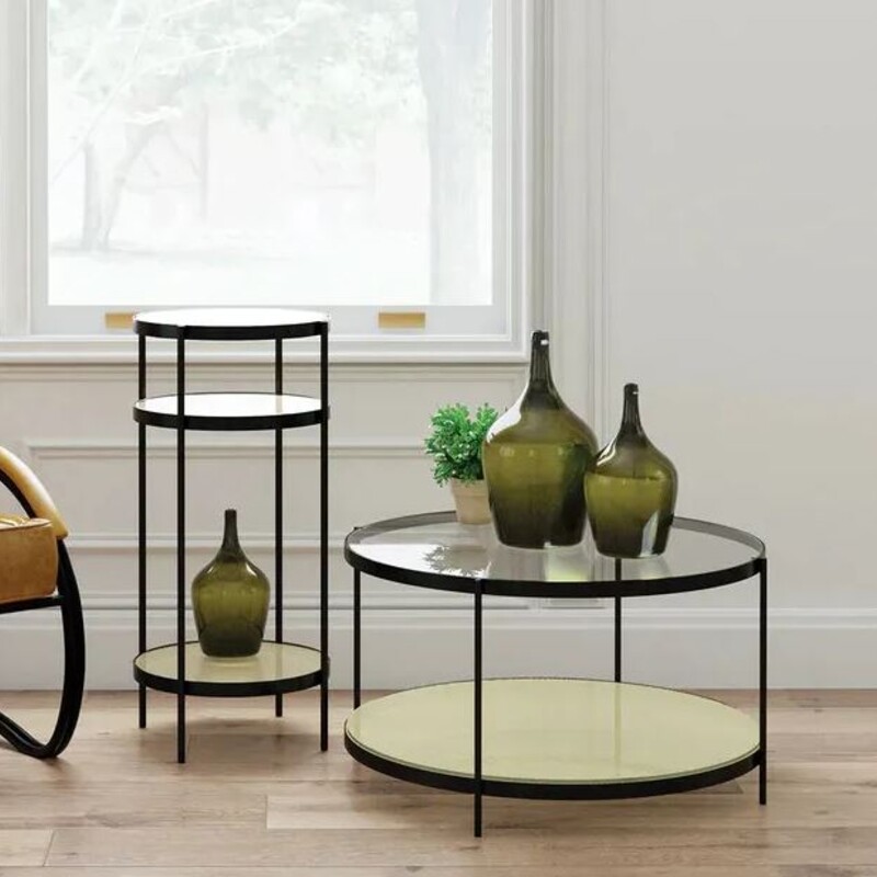 Mia Cane & Glass Side Accent Table
Black Clear Tan Size: 14 x 30H
BRAND NEW
Retails: $570+
Matching table and coffee table sold separately

The three-tier Mia Side Table offers a combination of storage and style. The round table has an iron framing that is finished in a contemporary and versatile black. The tabletop is made of smoky glass while the two lower shelves are covered in a tight, naturally hued rattan weave that creates a striking contrast to the bold frame.