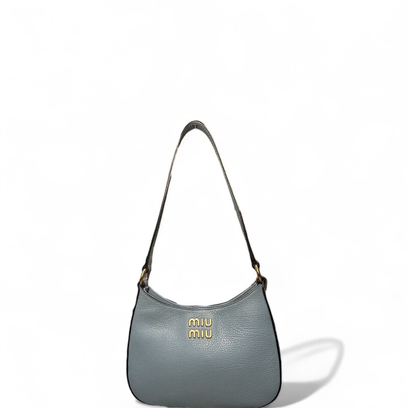 Miu Miu Madras Hobo Astrale

Dimensions:
Height: 18 cm,Length: 23 cm,Width: 5 cm
Shoulder Strap: 23.5 cm

Excellent condition.

Does not come with the original dust bag or box.