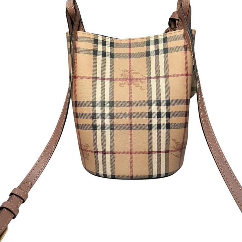 Burberry Haymarket Check Bucket Elderberry<br />
<br />
Dimensions: 9 H x  7L<br />
<br />
In very good  condition. Some interior pen marks.<br />
<br />
Does not come with original dust bag or box