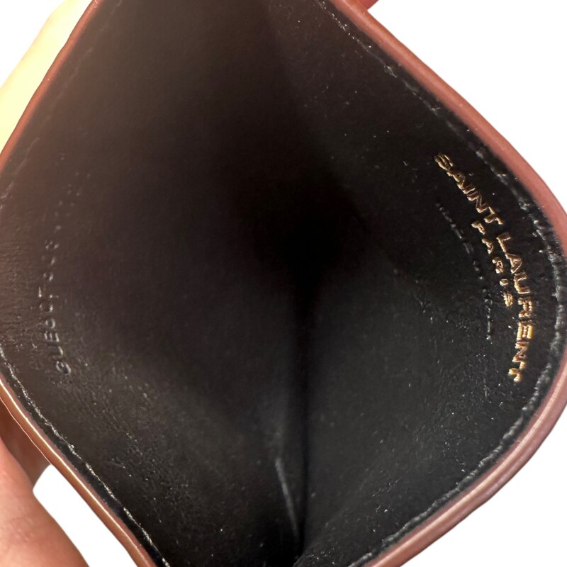 Saint Laurent Tiny Cassandre Wallet<br />
<br />
Brown<br />
<br />
Style Code:GUE607603.1121<br />
<br />
Very good condition. Light scratching on hardware.<br />
<br />
Comes with the original dust bag and box.