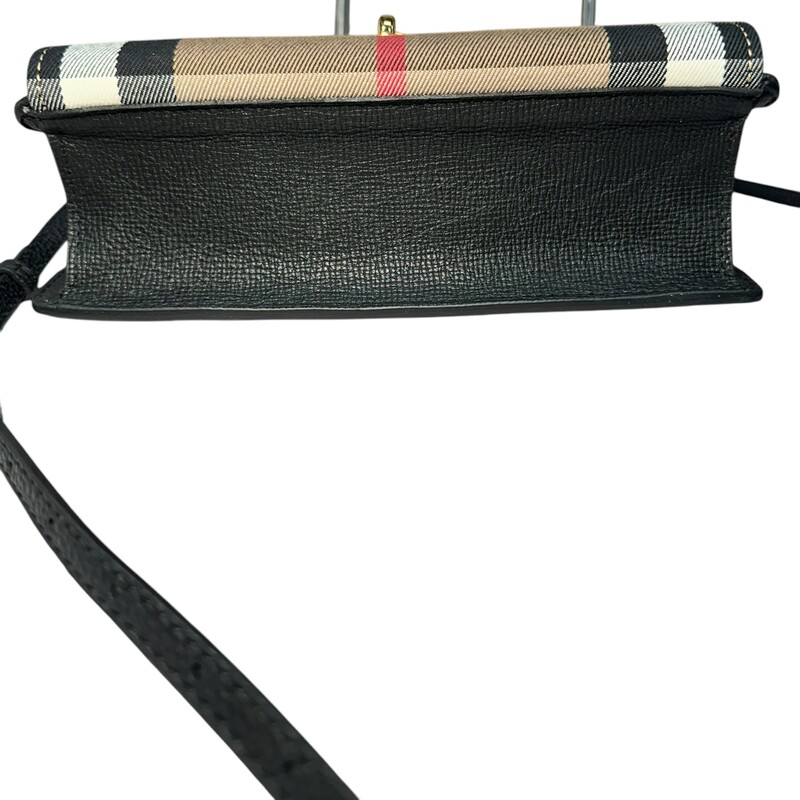 Burberry Macken Black Crossbody<br />
<br />
Style Code:CFPPAN1301<br />
<br />
Dimensions:9.5L x6H<br />
<br />
In very good condition. Some minor scratches on hardware.<br />
<br />
Does not come with original dust bag or box.