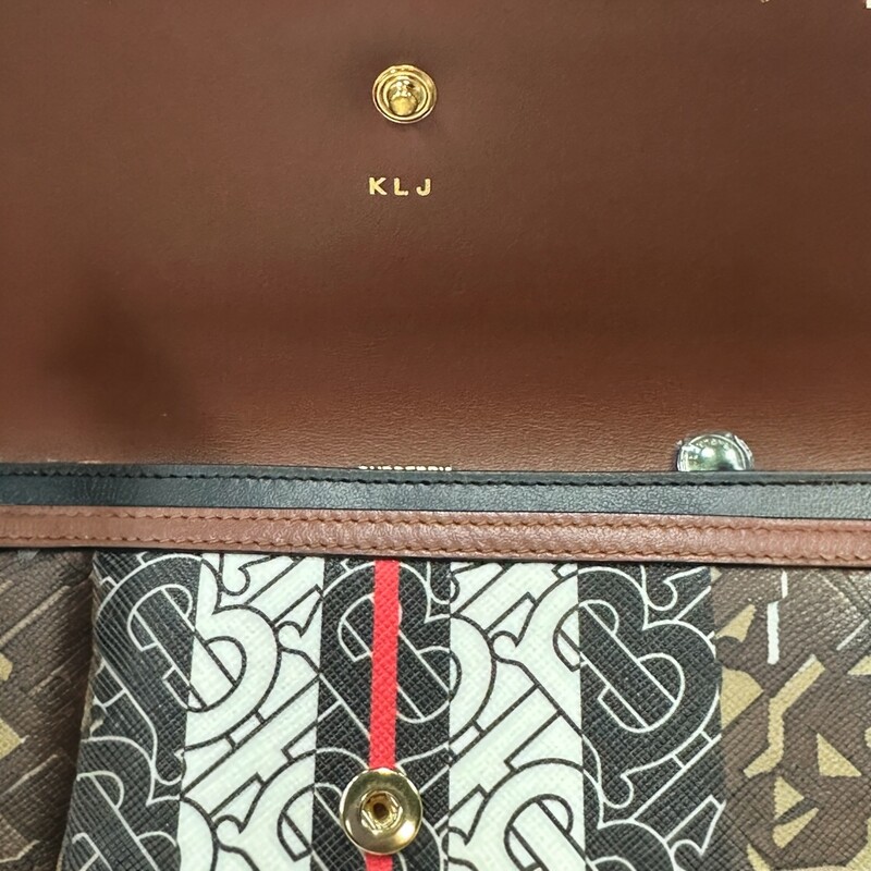 Burberry E- canvas Monogram Stripe Wallet

Dimensions:7.5L x4H

In excellent condition. Note does have initals KLJ by the snap.

Does not come with original dust bag or box.