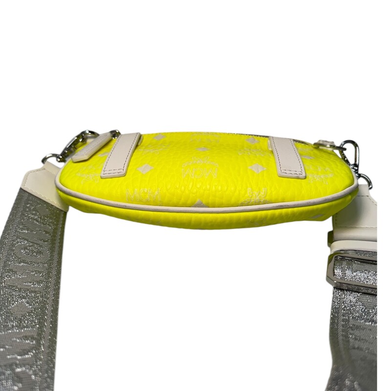 MCM Crossbody Belt Bag Neon Small<br />
<br />
Dimensions:<br />
8.5in W x 1.75in D x 4.5in H<br />
<br />
In very good condition. Light wear to exterior leather.<br />
<br />
Does not come with the original dust bag or box.