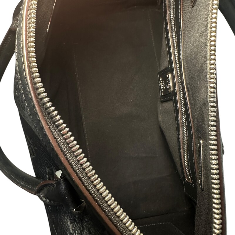 MCM  Black Essentials Boston Duffle With Detachable Strap<br />
<br />
Dimensions: Length: 12 x Heigth: 8<br />
<br />
Very good condition. Some handle wear. some minor scratching on hardware.<br />
<br />
Does not come with original dust bag or box.