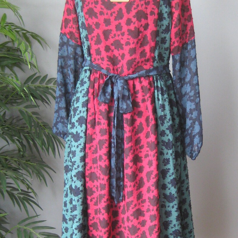 NWT Matilda Jane, Multi, Size: XS<br />
This dress was clearly inspired by the beautiful boho peasant dresses made in the 1970s by Diane Freis and her sister Susan.<br />
It features a patchwork of coordinating fabrics, the tassellated neck ties and the loose 3/4 length sleeves.<br />
Look up Diane Freis if you want to see what I mean.<br />
This dress is by a modern company, Matilda Jane and it's brand new, never worn.<br />
tealish navy blue, burgundy and dark green flocked (tufted) fabric, elasticized waist.<br />
Burgundy velvet trims the neck opening.<br />
It's marked size XS but will fit a bit bigger as well.<br />
Here are the flat measurements:<br />
shoulder to shoulder: 14<br />
armpit to armpit: 19<br />
waist: 18.5<br />
hip: free<br />
underarm sleeve length 15 (3/4 length)<br />
length: aprox 37 in the front, aprox 43 in the back.<br />
Perfect brand new condition.<br />
Thanks for looking!<br />
#69960