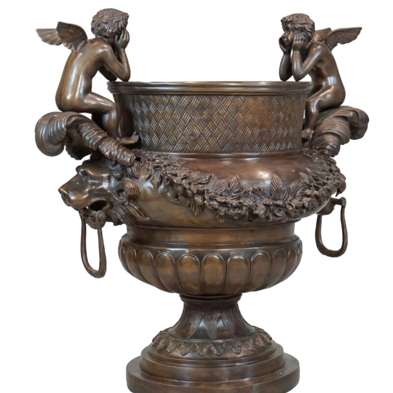 Bronze Cherub Urn+Florals
Brown Bronze Urn with Purple Green Floral
Urn+Florals Size: 36x53H
Urn Alone Size: 24x22H
Urn Made of Bronze (Lost Wax Casting Method)
Suitable for Indoor or Outdoor/Garden Use
Traditional-Antique Inspired Design
Retail $4K+
Exquisite-Must See in Person