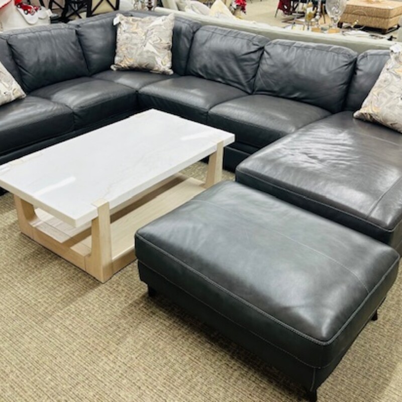 3 Piece Italian Leather Sectional with Ottoman<br />
Dark Grey Leather<br />
Sectional Overall Size: 129 x 91 x 34H<br />
Ottoman Size: 38 x 27 x 18H<br />
Chaise Size: 35 x 67 x 34H<br />
Retail $5500