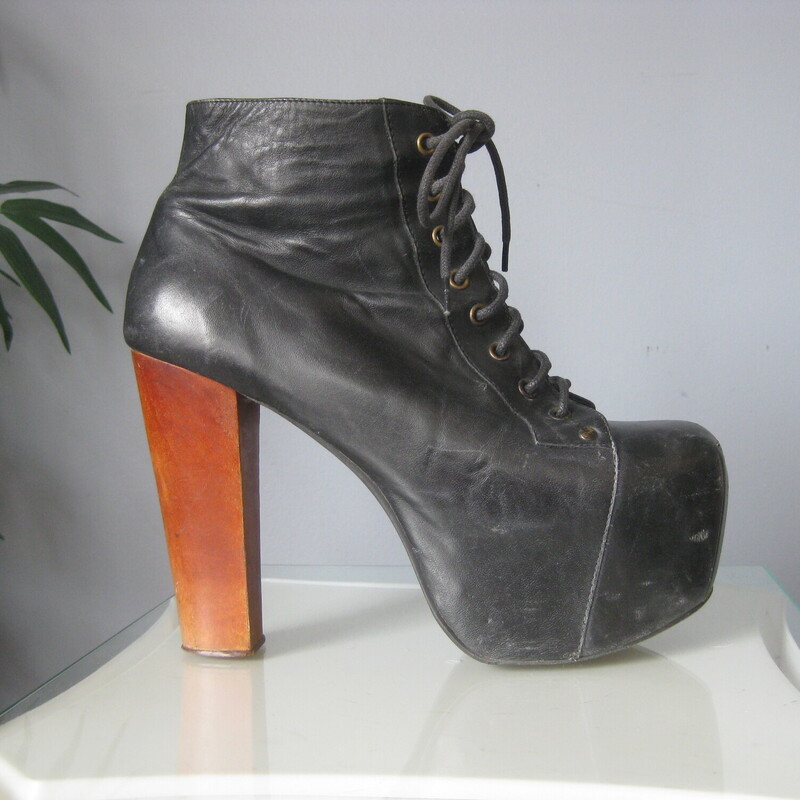 Jeffrey Campbell Litas, Black, Size: 9<br />
Omg I loved these.<br />
I wore them alot.<br />
But it's time to find them a new home.<br />
These are my Size 9 Jeffrey Campbell Litas that I bought in 2006.<br />
They're black leather lace up ankle boots with a 3 platform and 5 block heels.<br />
You can lace these up and run around all night without much pain.<br />
<br />
They're in good pre-owned condition with cosmetic signs of wear and use on the leather as shown.<br />
Also some signs of use on the heels.<br />
They could use a nice new heel cap.<br />
pls be sure to look at all of my pictures.  I shot each shoe from both sides, tops and bottoms fronts and back.<br />
Priced accordingly -<br />
<br />
thanks for looking!<br />
#83262