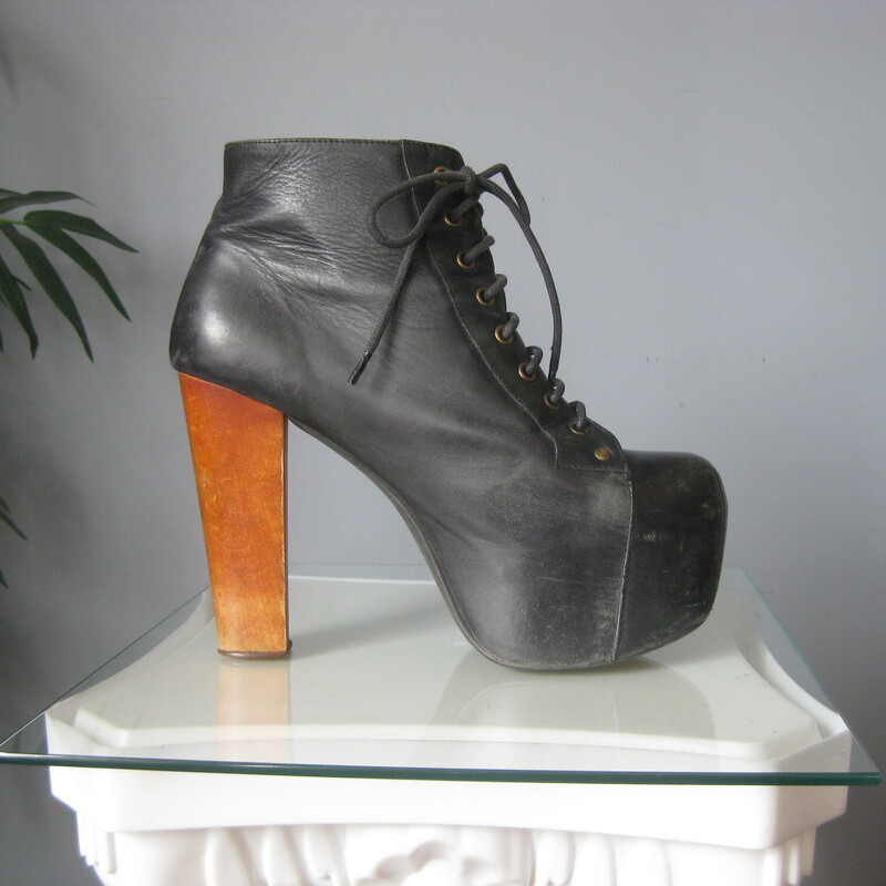 Jeffrey Campbell Litas, Black, Size: 9<br />
Omg I loved these.<br />
I wore them alot.<br />
But it's time to find them a new home.<br />
These are my Size 9 Jeffrey Campbell Litas that I bought in 2006.<br />
They're black leather lace up ankle boots with a 3 platform and 5 block heels.<br />
You can lace these up and run around all night without much pain.<br />
<br />
They're in good pre-owned condition with cosmetic signs of wear and use on the leather as shown.<br />
Also some signs of use on the heels.<br />
They could use a nice new heel cap.<br />
pls be sure to look at all of my pictures.  I shot each shoe from both sides, tops and bottoms fronts and back.<br />
Priced accordingly -<br />
<br />
thanks for looking!<br />
#83262