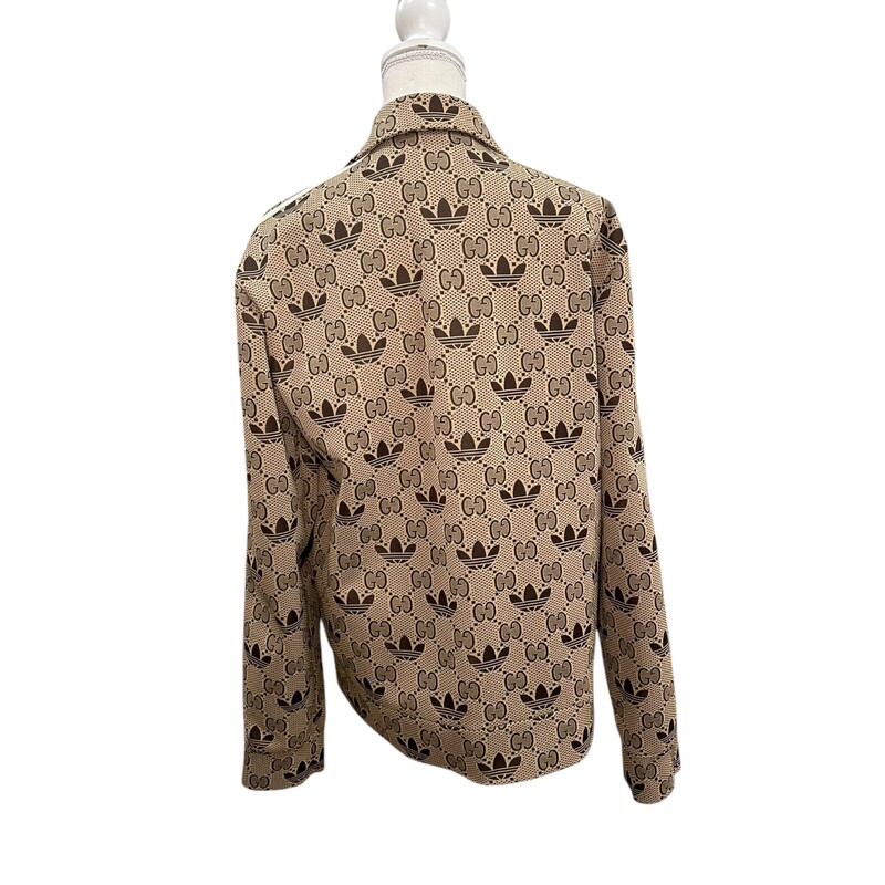 Gucci Adidas Printed Truck Jacket<br />
Beige<br />
Size: Large<br />
In excellent condition.