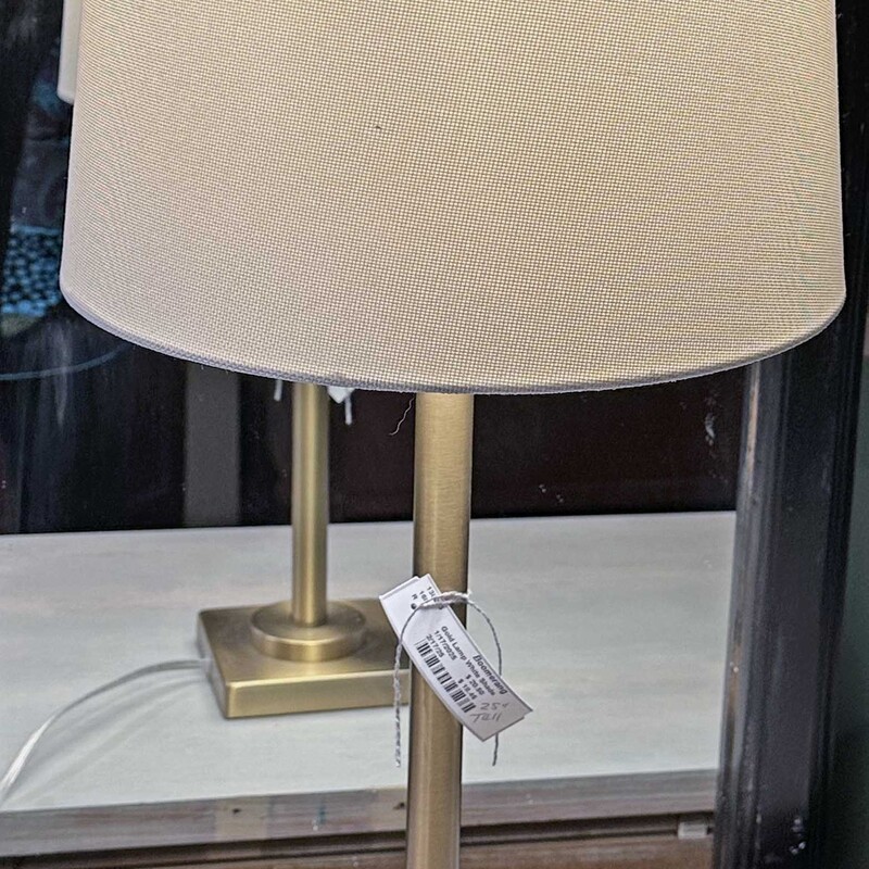 Gold Lamp with White Shade
25 In Tall.